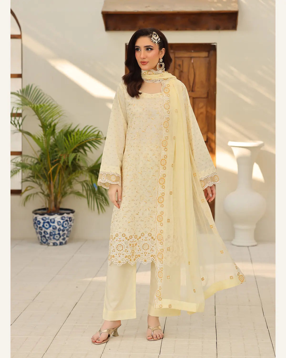Ivory Marigold embroidered Broshia lawn suit full-length view