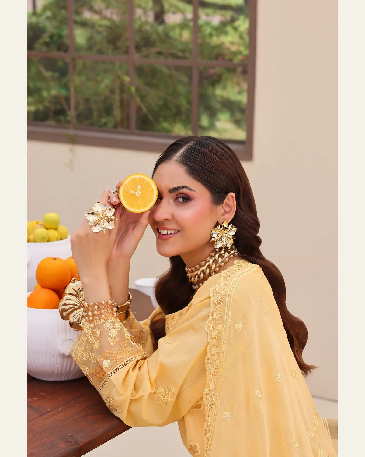 Silent Meadow marigold lawn sleeve and embroidery lifestyle detail